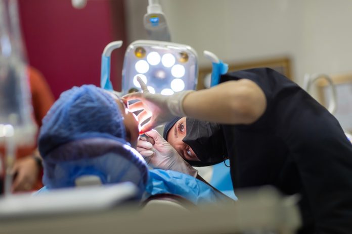 A,Dentist,Making,A,Implant,Operation,Dental,Health,Perfect,Smile